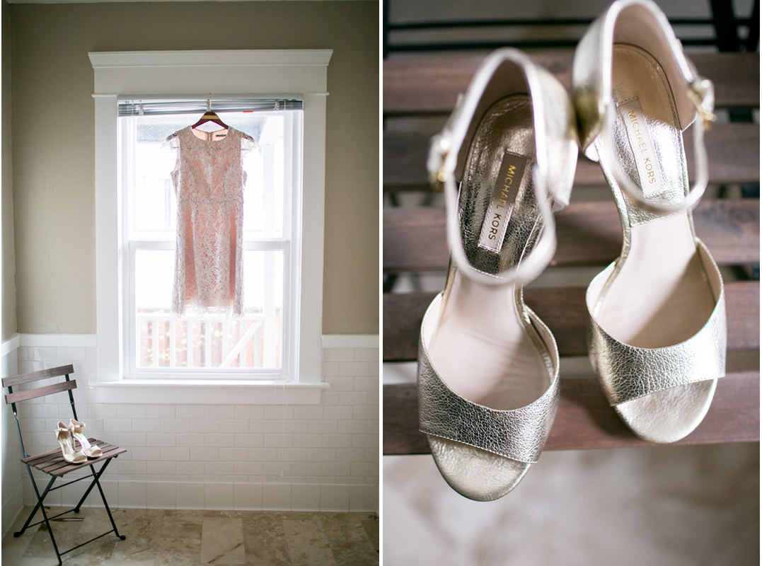 A light pink lace dress hangs in a window; next to it, a pair of gold open-toe heels rest on a wooden chair. Jessica Hill Photography - Wedding Photographer - Oregon