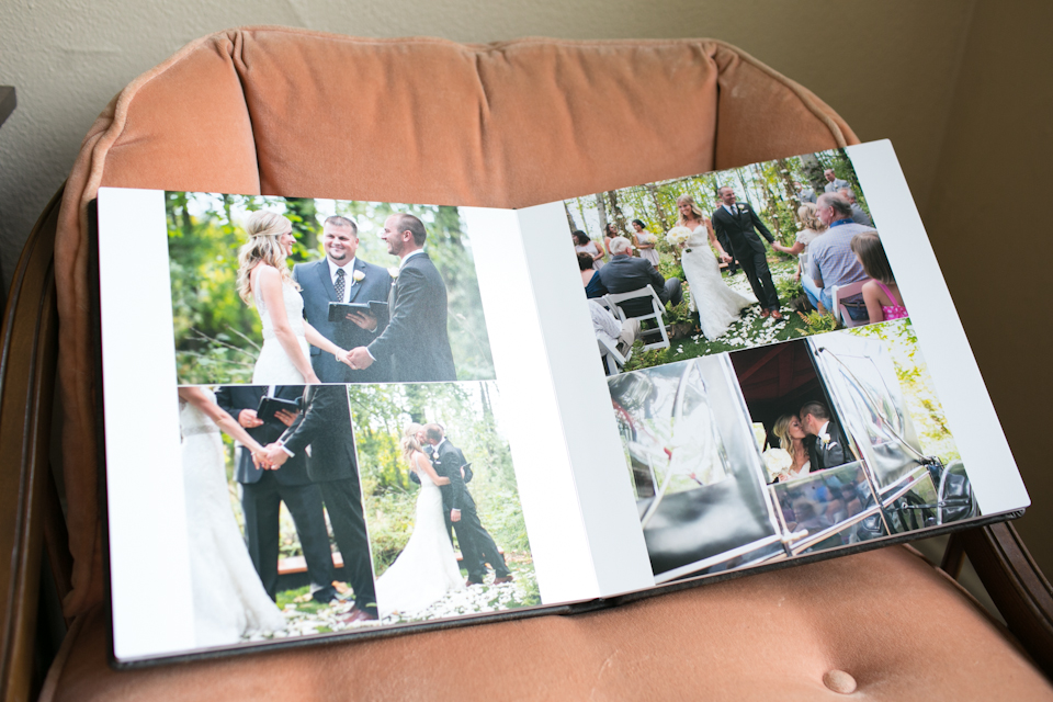 An open photo album displaying wedding ceremony and reception photos is placed on a cushioned chair. Jessica Hill Photography - Wedding Photographer - Oregon