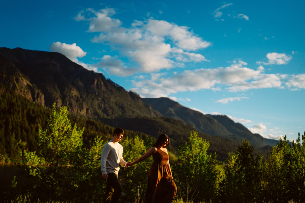 Couple walking in scenic mountain landscape
